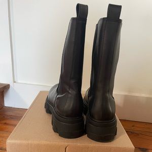 Lug sole black Steve Madden boots. Never worn.